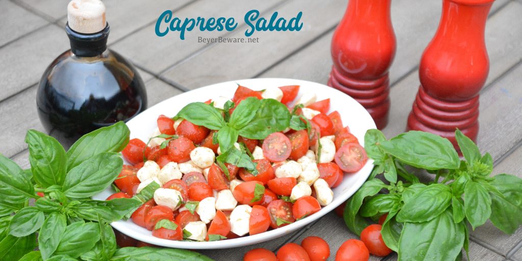 Caprese Salad is a simple fresh tomato salad recipe made with fresh tomatoes, basil, and mozzarella with balsamic vinegar and olive oil for a quick and easy side dish all summer long.