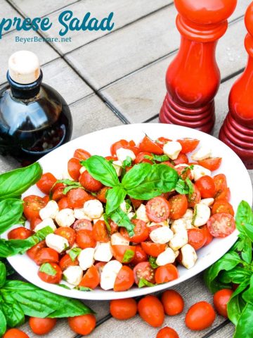 Caprese Salad is a simple fresh tomato salad recipe made with fresh tomatoes, basil, and mozzarella with balsamic vinegar and olive oil for a quick and easy side dish all summer long.