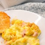 Cheesy ham and scrambled egg casserole recipe is a breadless egg and ham bake made the night before with scrambled eggs and a velvety cheese sauce and a bread crumb topping. This is a great recipe for Easter or Christmas Breakfast morning.