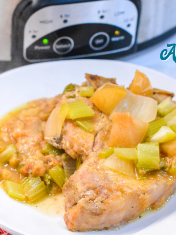 Crock pot apple pork chops is a flavorful crock pot pork chop recipe with lots of apples, onions, celery and cornbread stuffing.