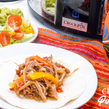 Crock Pot Pork Fajitas recipe is easy to make in a slow cooker along with a pork loin roast, can of Rotel, fajita seasonings, onions and peppers slow cooked all day for an easy weeknight dinner or Taco Tuesday.