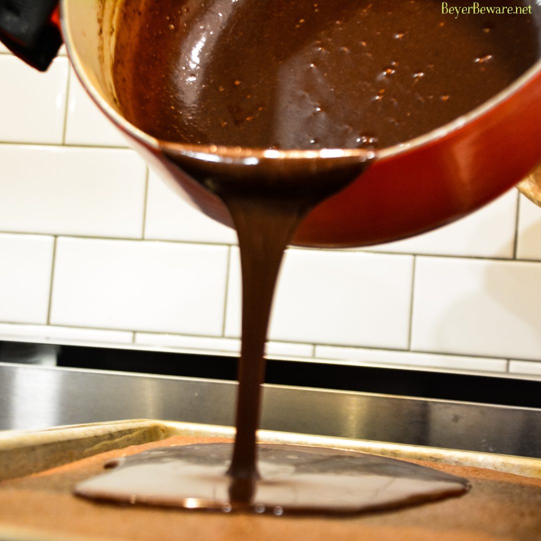 Grandma's Texas Sheet Cake is a tried and true chocolate sheet cake recipe with all the cocoa and butter in the recipe to make it so outrageously delicious.