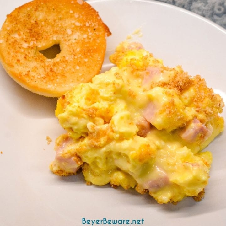 Cheesy ham and scrambled egg casserole recipe is a breadless egg and ham bake made the night before with scrambled eggs and a velvety cheese sauce and a bread crumb topping. This is a great recipe for Easter or Christmas Breakfast morning.