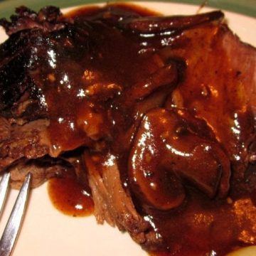 Crock Pot Coffee Beef Roast combines coffee, mushroom, onions, garlic to create a rich and flavorful sauce for a beef roast to slow cook in all day creating a tender and juicy crock pot roast. #CrockPot #Roast #Beef #BeefRoast