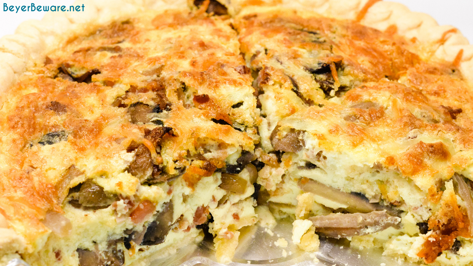 Bacon and mushroom quiche is an easy quiche recipe filled with crispy fried bacon pieces, hearty mushrooms, and lots of cheese.