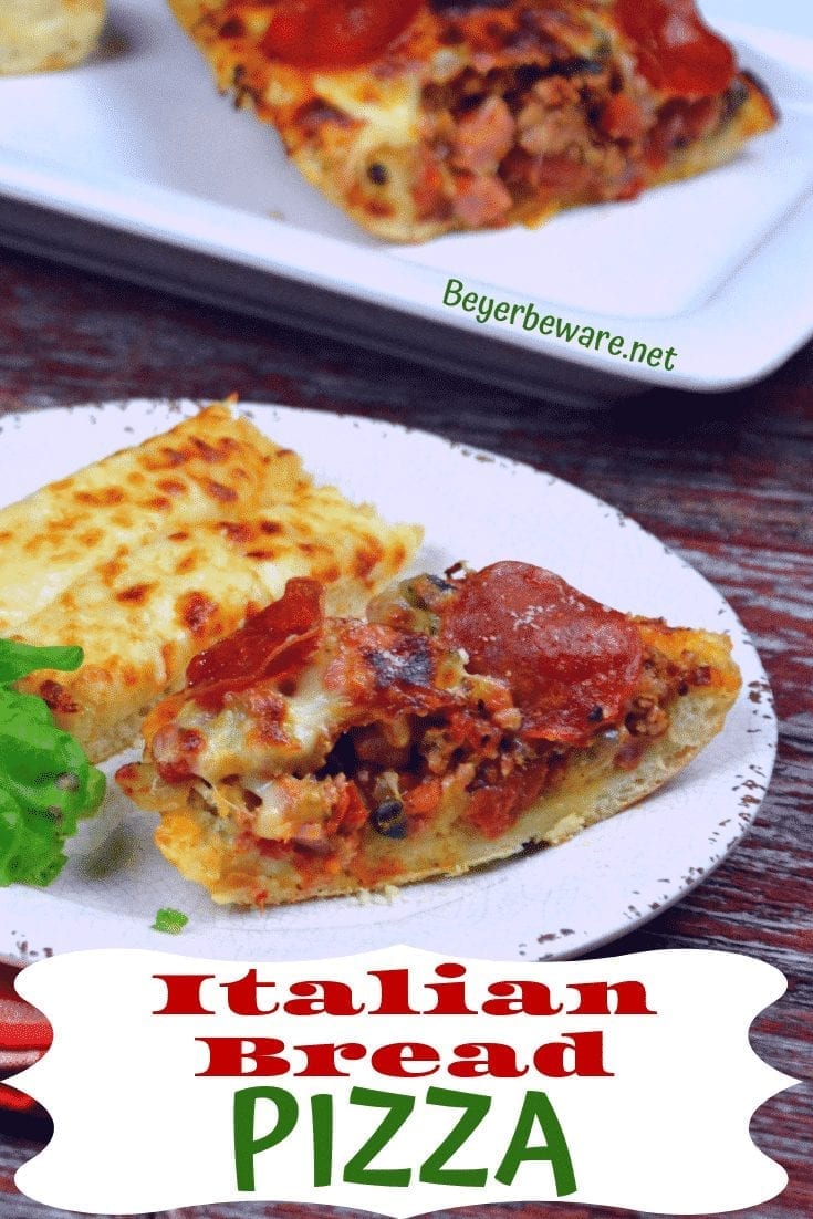 Italian Bread Pizza takes a big loaf of Italian bread as the perfect crust for cheesy pizza loaf. Combine all of your favorite pizza toppings with sauce and put into a hollowed out half of the Italian bread and top with lots of cheese for a quick deep dish pizza. #Pizza #PizzaLoaf #Cheese #weeknightmeal #FingerFood #Appetizer