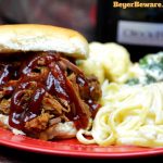This slow cooker root beer beef bbq recipe is the perfect combination of sweet and heat with a hint of smoke to leave your summer BBQ cravings satisfied.