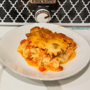 Crock pot lasagna is an easy lasagna recipe using no-boil or regular lasagna noodles that can slow cook in your casserole crock pot all day long.