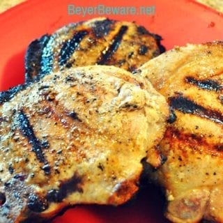 One way to make sure you have juicy grilled pork chops is to make grilled brined pork chops. OH, and cooking just to 150 degrees before letting the pork chops rest.