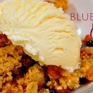 The combination of peaches and blueberry makes this easy peach blueberry crisp recipe topped with ice cream a perfect summer dessert.