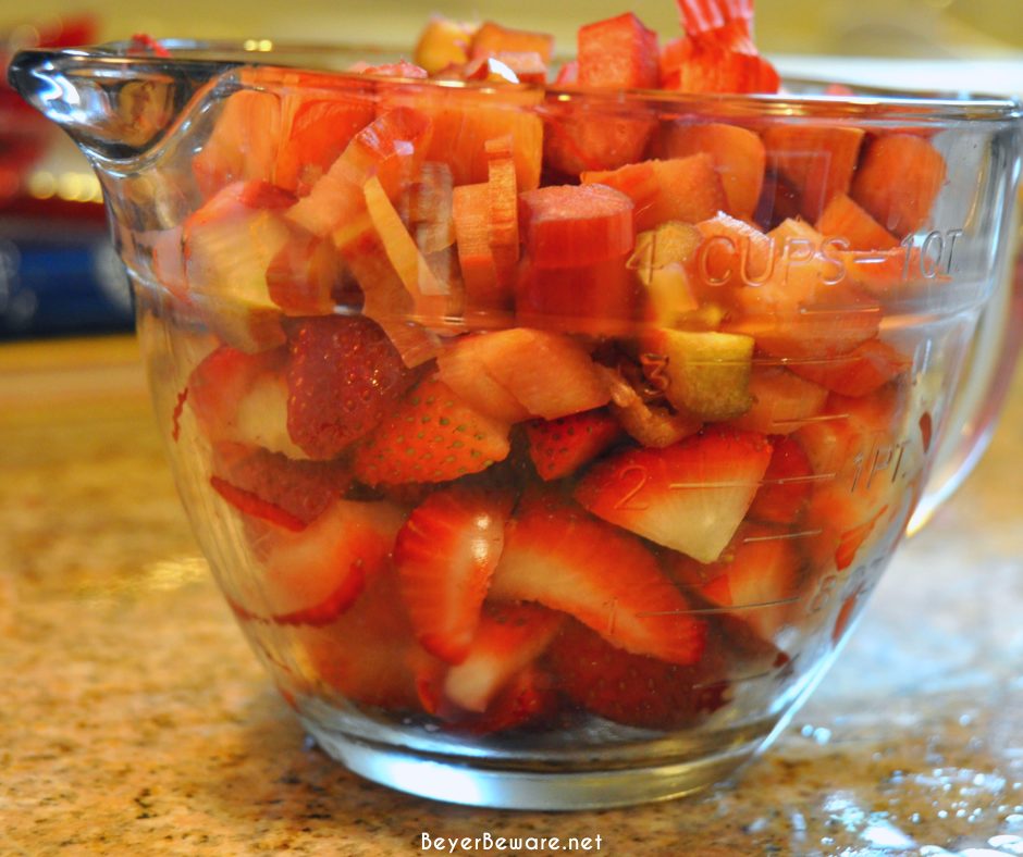 Strawberry rhubarb pie is a phenomenon in the spring and early summer in the midwest and this crumb topped version of the sweet and tart pie is so easy to make.