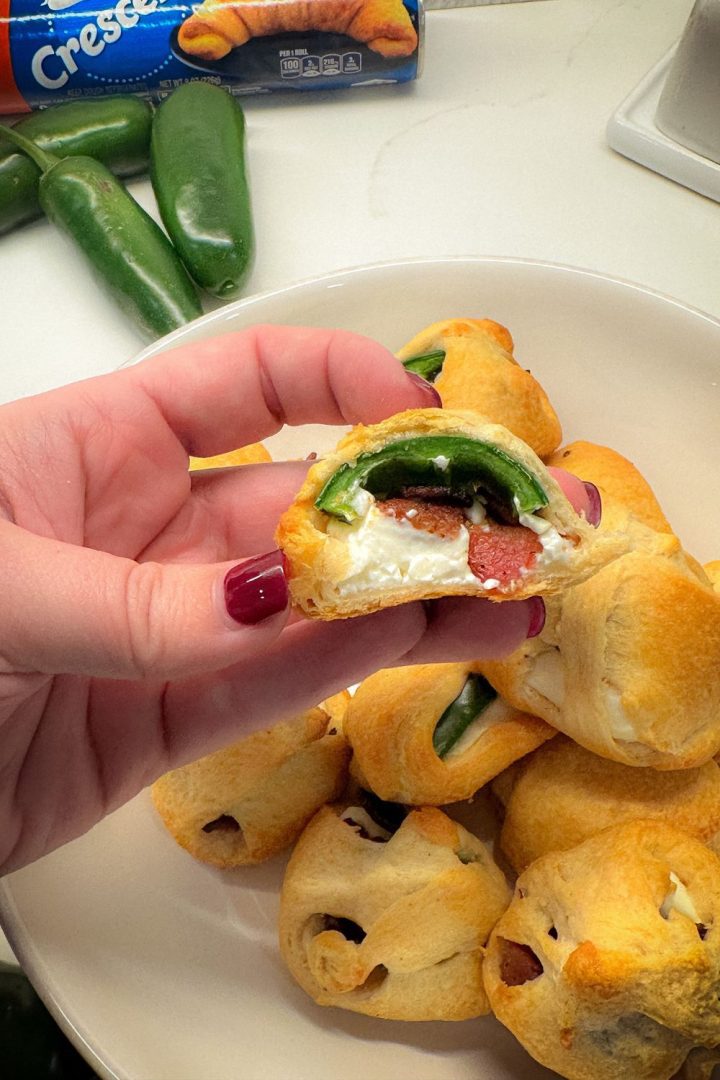 This unique jalapeño popper recipe is just four ingredients - crescent rolls, cream cheese, bacon, and jalapeños.