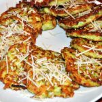 These crispy zucchini fritters are a simple recipe that is a great way to use zucchini and a lower carb alternative to potato pancakes.