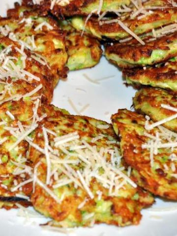 These crispy zucchini fritters are a simple recipe that is a great way to use zucchini and a lower carb alternative to potato pancakes.