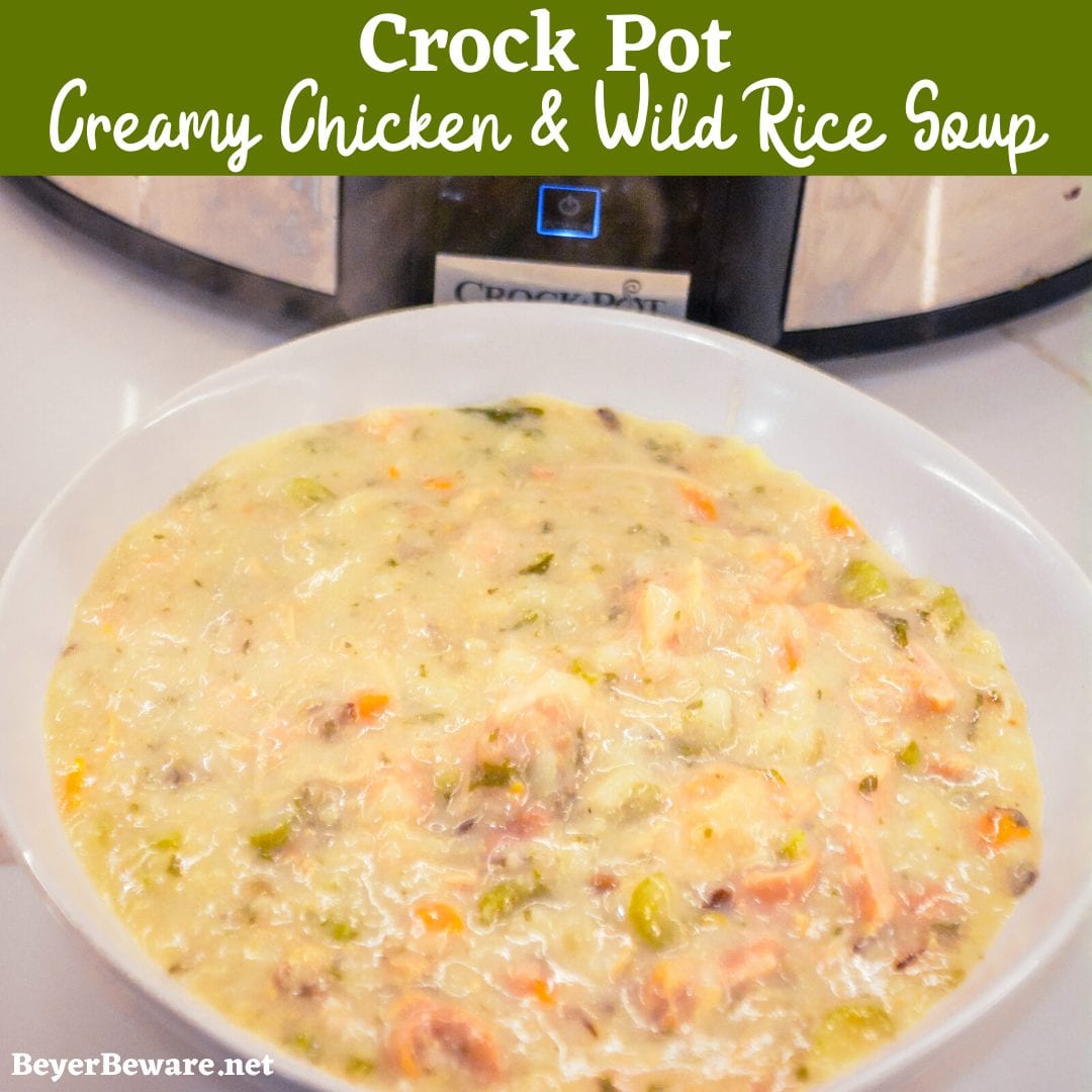 Crock pot creamy chicken and wild rice soup is slow-cooked all day in a base of carrots, celery, onions, and garlic and then made creamy with a simple white sauce to quickly become your family\'s favorite hearty soup recipe.