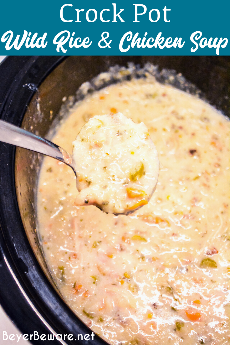 Crockpot creamy chicken and wild rice soup recipe is made with long grain and wild rice, celery, carrots, onions, chicken, and milk to form a cream based chicken soup.