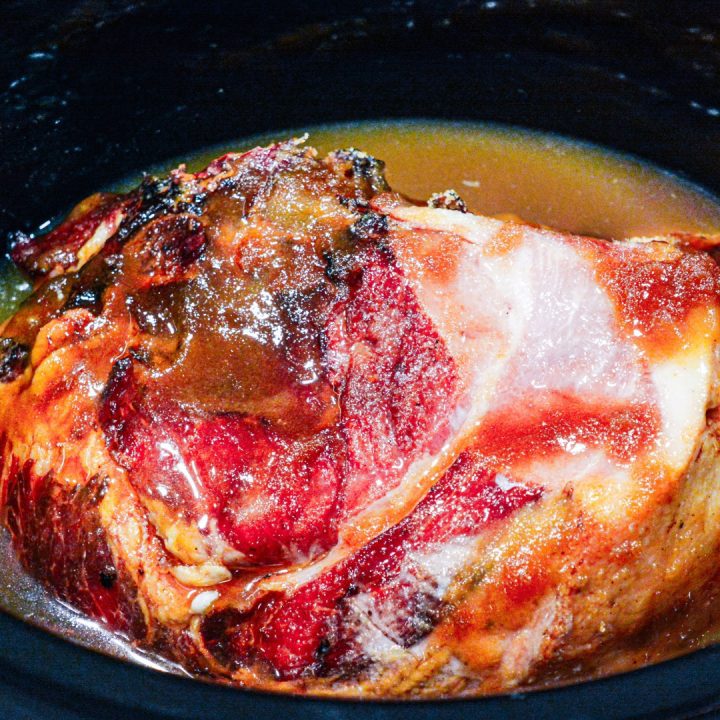 Crock Pot Holiday Ham is slow cooked in brown sugar, maple syrup, and pineapple juice making this crock pot maple ham perfect for the Thanksgiving or Christmas dinner table.