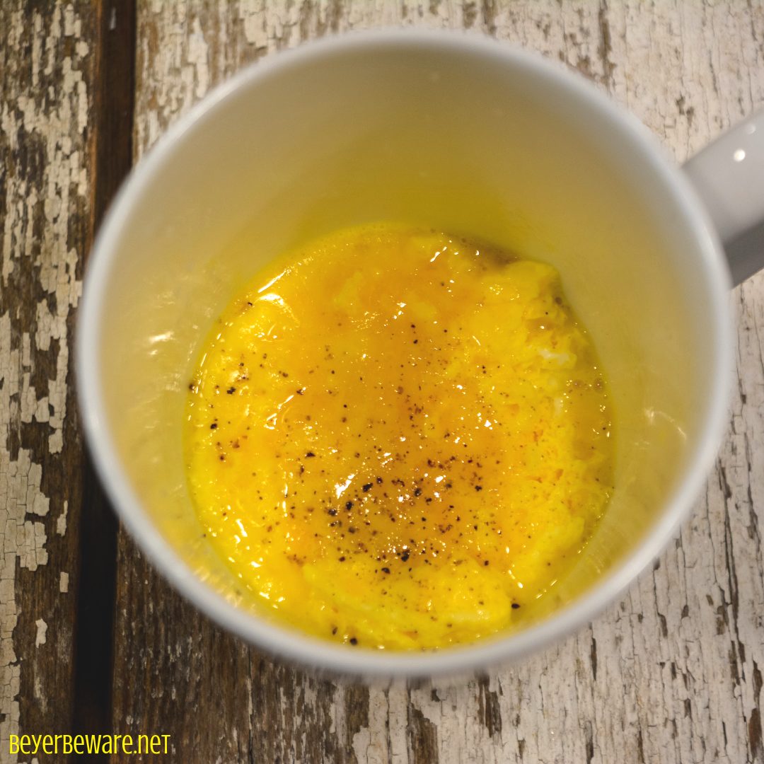 Microwave scrambled eggs in 1 minute is a perfect protein based breakfast for people needing a breakfast quick and on-the-go. Drop the eggs in a coffee mug and cook them in the mug to take with you when you leave to eat on the run. #Breakfast #QuickBreakfastIdeas #Eggs #microwave #Protein #LowCarb #Keto