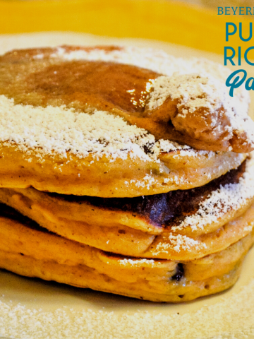 Pumpkin ricotta pancakes are a fluffy, pancake with all the fall flavors with both real pumpkin and ricotta in the batter with lots of fall spices. Add chocolate chips to make them even more decadent.