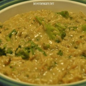 One pan cheesy broccoli, rice, and walnut casserole combines a boxed rice pilaf mix with steamed broccoli, cheese and creamed soup for an easy, fancied up side dish. #sidedish #Ricepilaf #Broccoli #cheese