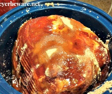 Ham slow cooked in a crock pot is juicy and the brown sugar, maple syrup and pineapple juice this crock pot maple ham is cooked in leaves it full of flavor.