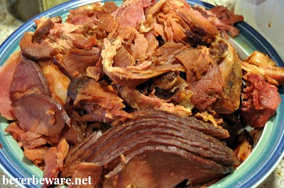 Ham slow cooked in a crock pot is juicy and the brown sugar, maple syrup and pineapple juice this crock pot maple ham is cooked in leaves it full of flavor.