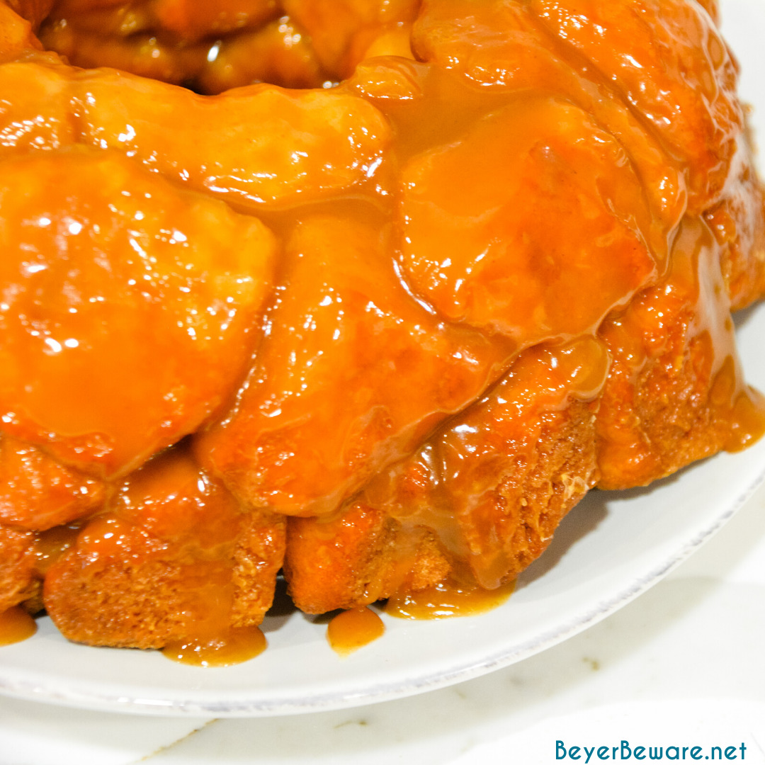 Monkey bread is a caramel pull-apart bread made with Grands biscuits, butter, sugar, and cinnamon then baked in a bundt cake pan for a gooey breakfast bread.