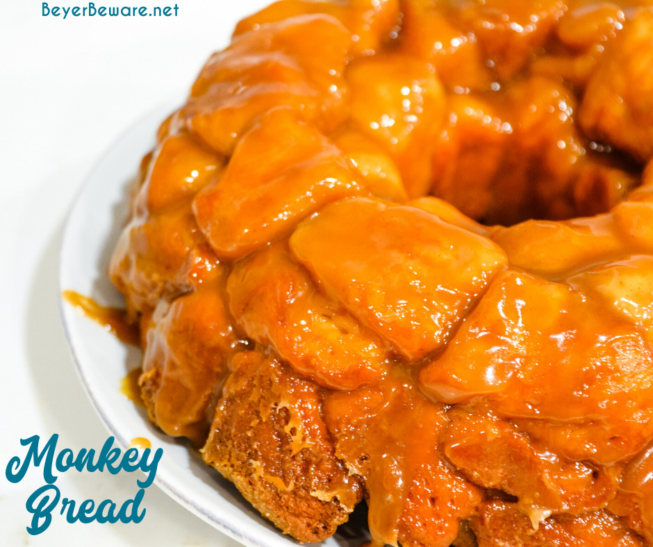 Monkey bread is a caramel pull-apart bread made with Grands biscuits, butter, sugar, and cinnamon then baked in a bundt cake pan for a gooey breakfast bread.