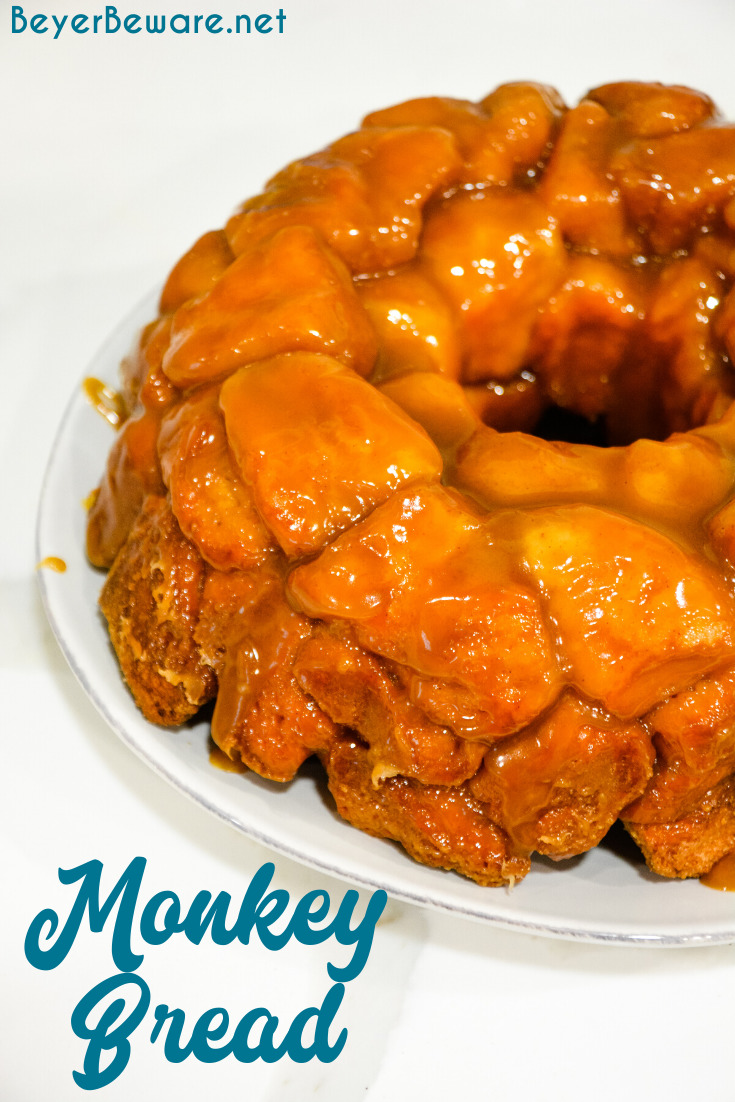 Monkey bread is a caramel pull-apart bread made with Grands biscuits, butter, sugar, and cinnamon then baked in a bundt cake pan for a gooey breakfast bread.