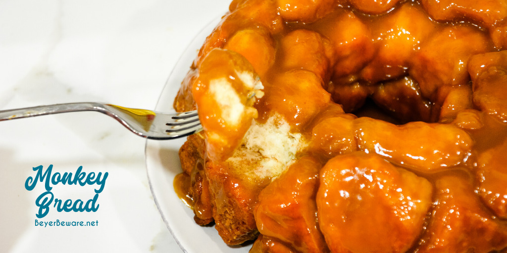 Monkey bread is a caramel pull-apart bread made with Grands biscuits, butter, sugar, and cinnamon then baked in a bundt cake pan for a gooey breakfast bread.