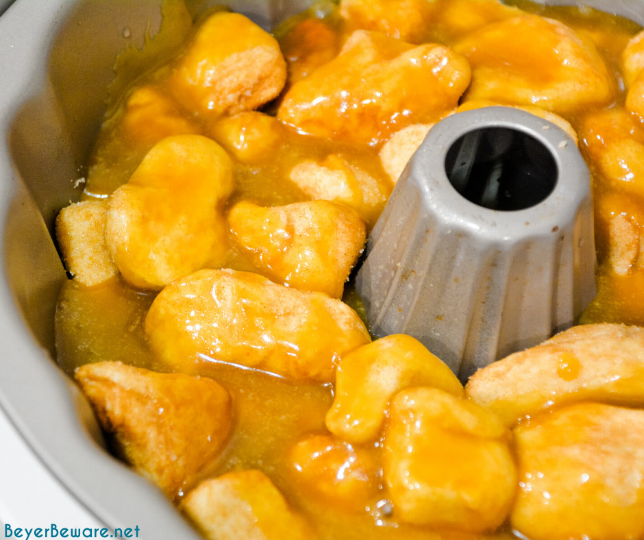 Monkey bread is a caramel pull-apart bread made with Grands biscuits, butter, sugar, and cinnamon then baked in a bundt cake pan for a gooey breakfast bread.