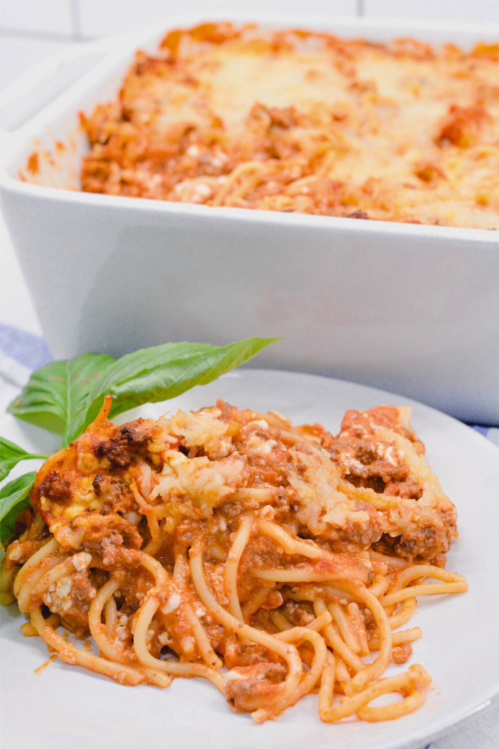 For a twist to the normal spaghetti and meatballs, try this creamy, 3 cheese baked spaghetti recipe on a quick weeknight dinner.