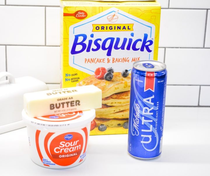 To make these beer biscuits you just need four ingredients that most likely are staples in your kitchen pantry and refrigerator - Bisquick biscuit mix, butter, sour cream, beer.