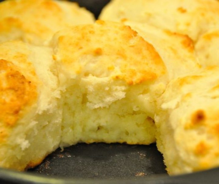 The beer biscuits grow together and form a butter-crisp bottomed biscuit with fluffy, pillowy insides for one of the best drop biscuit recipes.