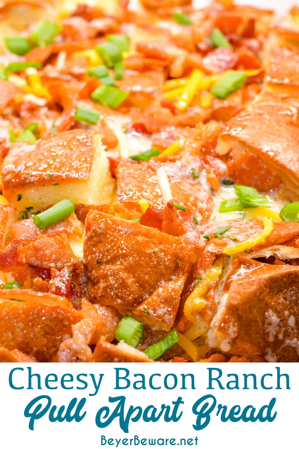 The cheesy ranch bacon pull-apart bread recipe is an easy appetizer made with a Hawaiian Bread round loaf that is filled with bacon, cheese, and, green onions ranch butter then baked to gooey crack bread perfection.