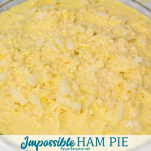 Make Impossible Ham Pie by layering ham, shredded cheese, diced onions, and a biscuit, egg, milk mixture over the top.