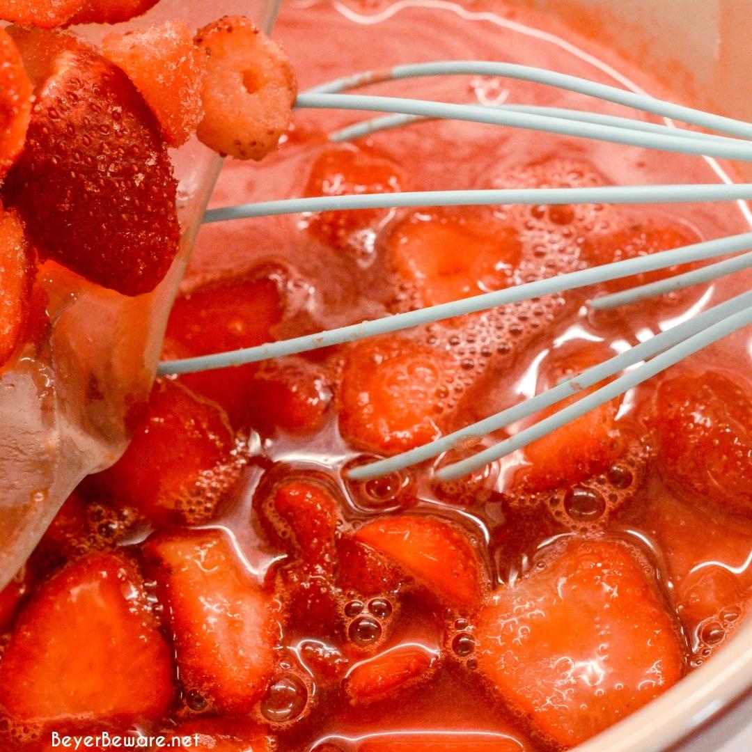 Strawberry Pretzel salad can be a dessert or side made with a sweet and salty pretzel crust, cream cheese center, and strawberry and jello topping.