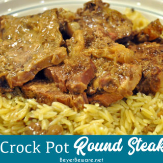 Crock Pot Round Steak with a mushroom cream sauce recipe is a low-cost tender beef dish that was perfect served with pasta or mashed potatoes for an easy weeknight meal.