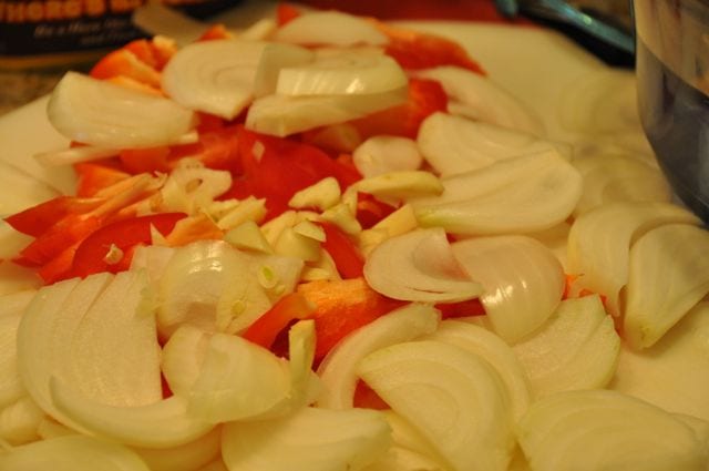 Bell Peppers, onions, and garlic sliced up