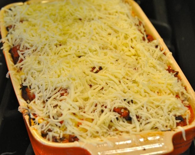 Cheese topped ravioli lasagna