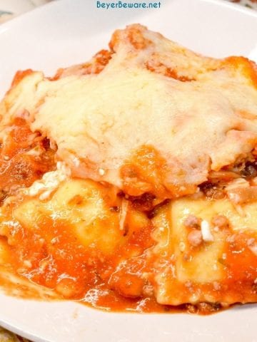 Ravioli Lasagna is a 5-ingredient recipe that combines cheese ravioli, ground beef, cheese and spaghetti sauce for an easy weeknight dinner.