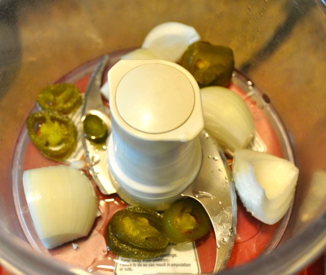 Jalapenos and onions in a food processor