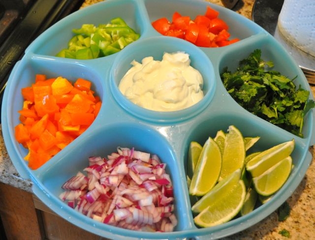 This easy Crock Pot Chicken Taco Bowls recipe that can feed a crowd and is gluten-free. This recipe will be your version of your favorite burrito bowl.