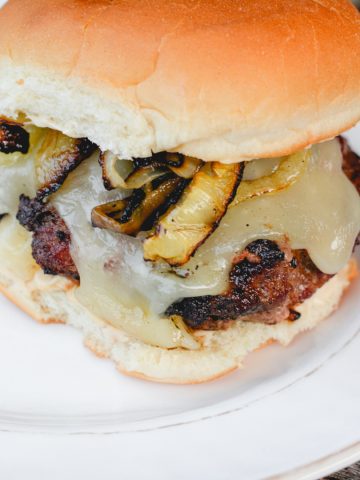 These all-beef patties are full of onion flavor and cheese for a new favorite French onion soup burger for French onion lovers.