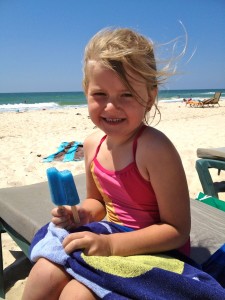 eating popsicles on the beach