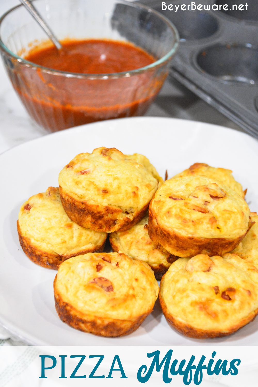 Pepperoni pizza muffins is a simple recipe made with lots of biscuit mix, pepperoni and cheese are a great lunch, dinner on the go or even pizza snack.