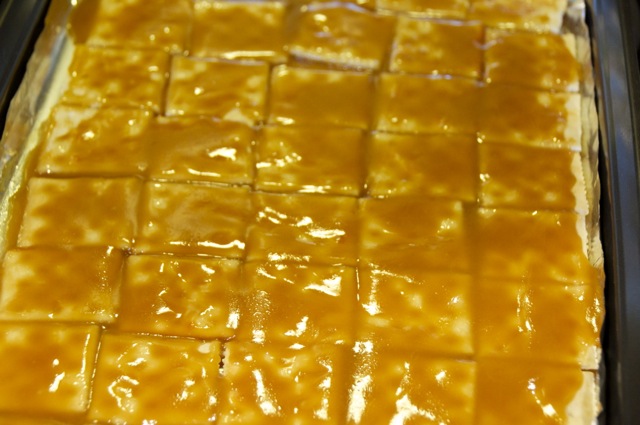 caramel mixture poured over crackers