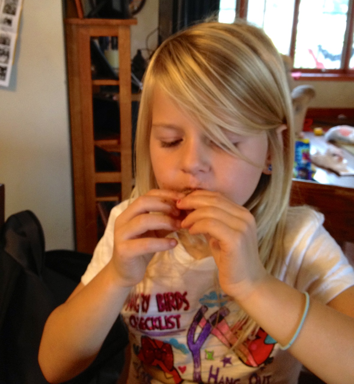 girl eating ribs