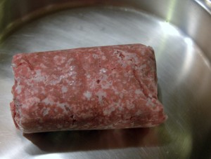 frozen ground beef in skillet