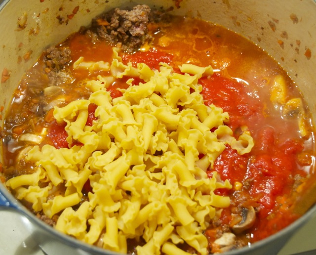 uncooked pasta, tomato sauce and seasoning for Speedy Skillet Lasagna.